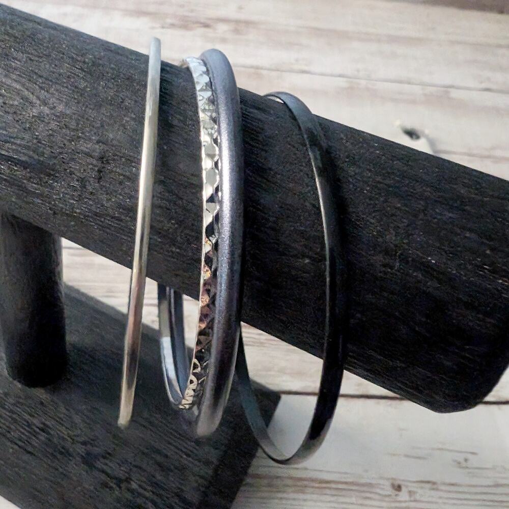 Four Assorted Fashion Bracelets / Bangles